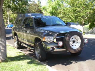 Illustration for article titled Front Mounted Spare Tires - Awesome, or Redneck?